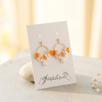 orange Micro Crochet Hydrangea Hoop Earrings on Petalore display card