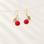 Petalore Red Berry berry micro crochet earrings — pair on an ivory display 