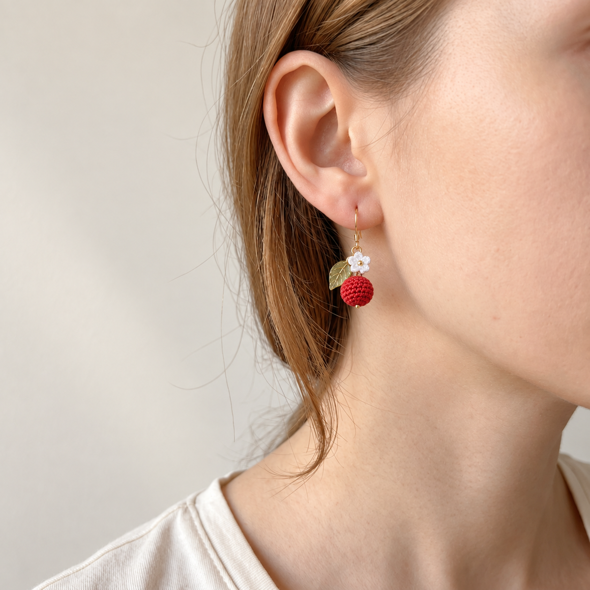 Petalore Red Berry berry micro crochet earrings — close-up wearing view 