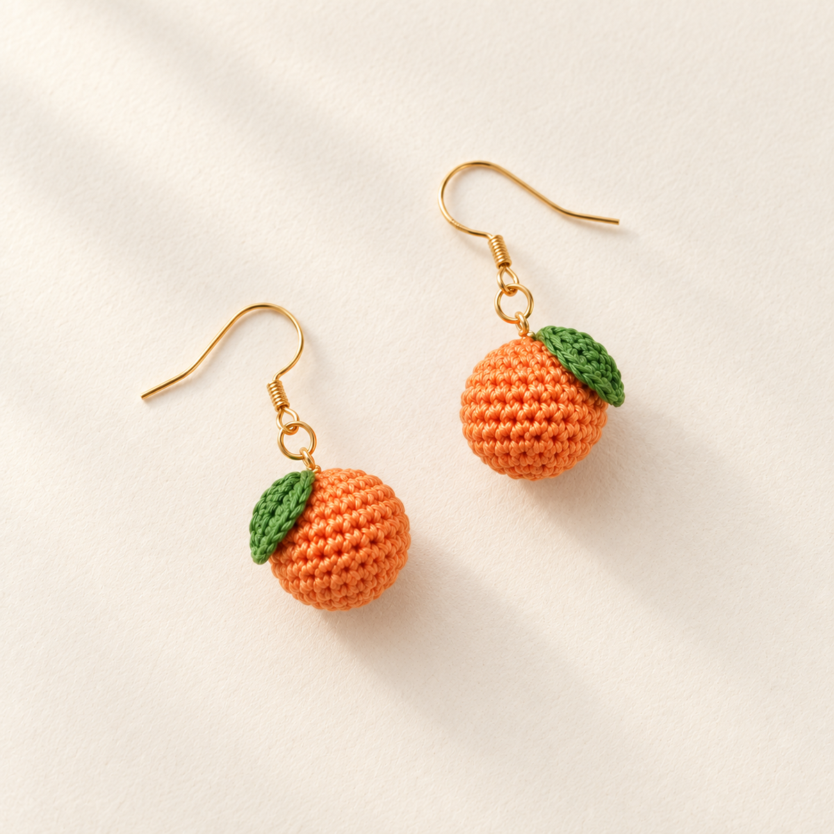 Micro crochet tangerine earrings — crochet detail