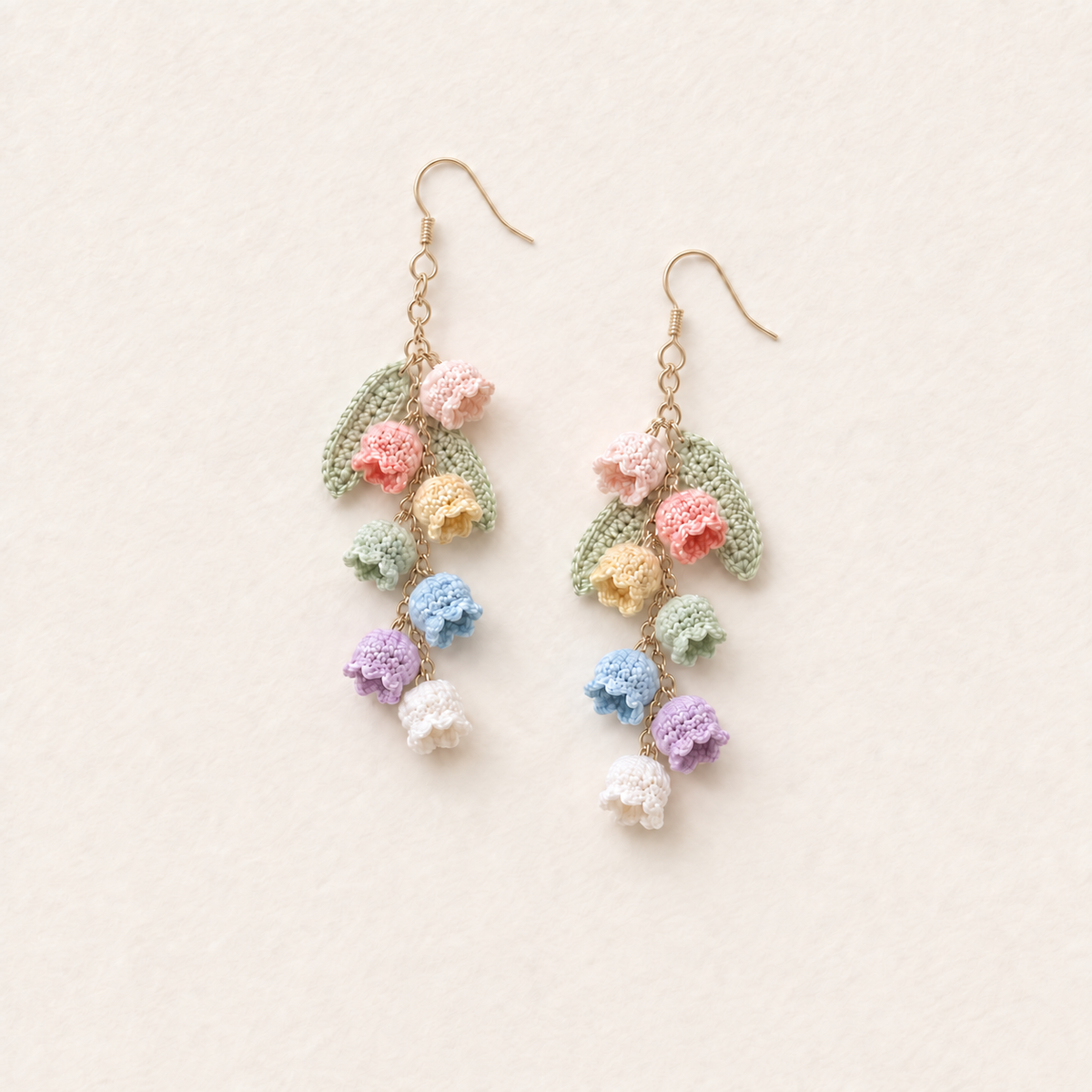 Petalore rainbow bell flower micro crochet earrings — crochet detail view