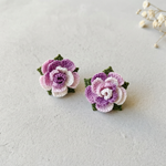 Micro Crochet Rose Stud Earrings flat lay with dried flowers