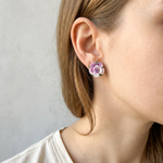 Woman wearing micro crochet rose stud earrings
