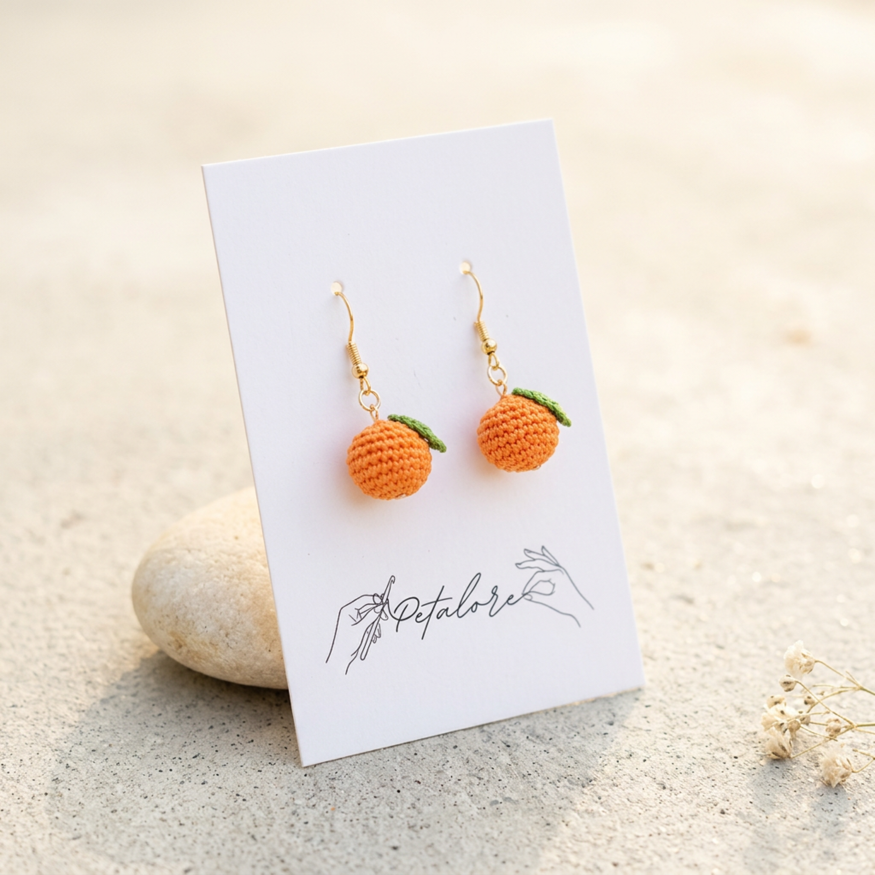 Micro Crochet Orange Earrings on Petalore display card